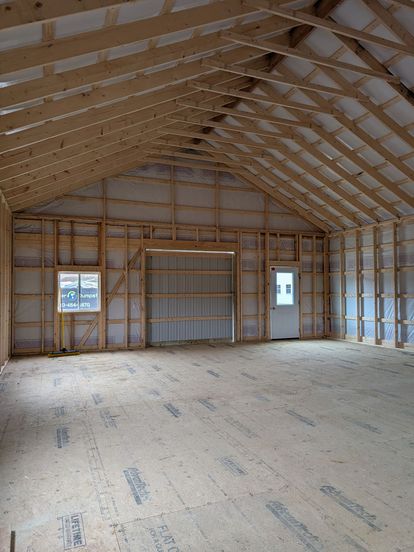 Detached garage with overhead doors